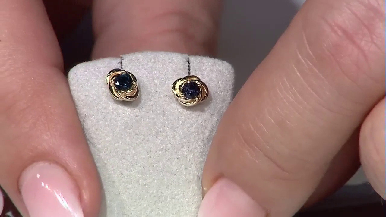 Video Gouden oorbellen met blauwe spinelstenen