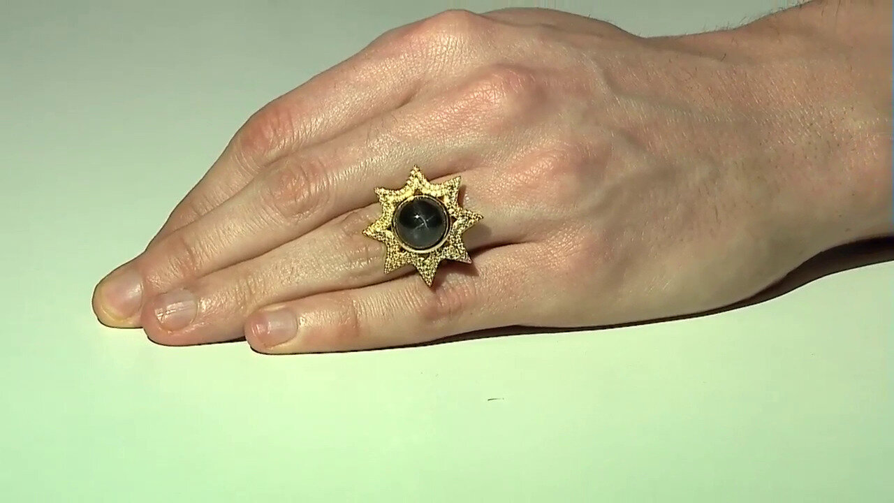 Video Zilveren ring met een Indische Ster Diopsied (de Melo)