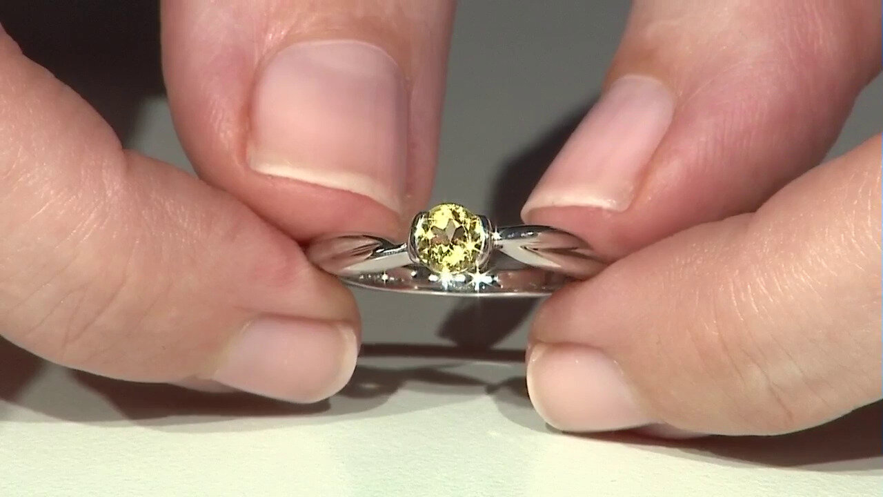 Video Zilveren ring met een gele beril